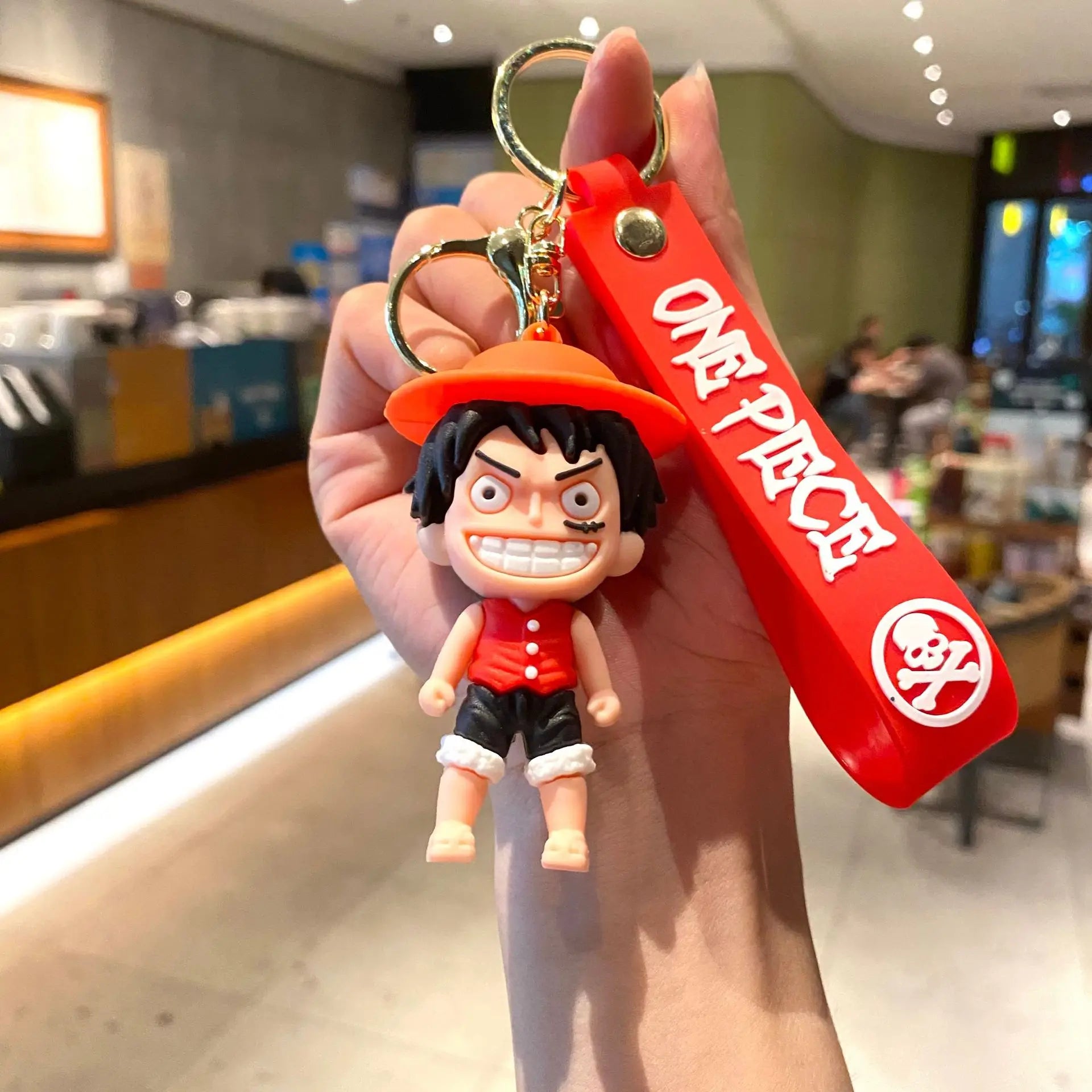 One Piece Cartoon Keychain – Luffy with Red Background | One Piece Boutique